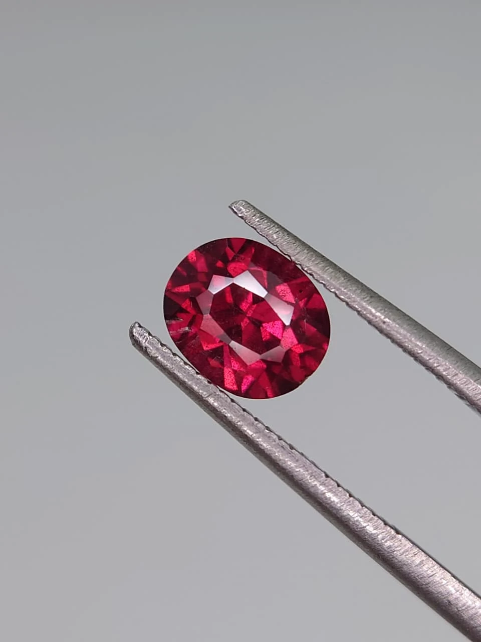 1.37ct Natural Oval Faceted Malaya Garnet from Tanzania — view 1
